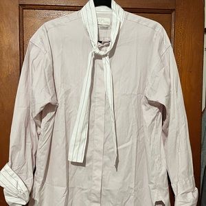 Never worn tie neck buttons up. Varied red pinstripes